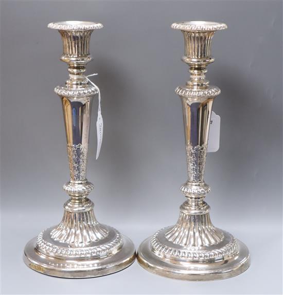 A pair of George III silver pillar candlesticks, acanthus-wrapped and gadroon-bordered, John Roberts & Co, Sheffield, 1813, 29.3cm.